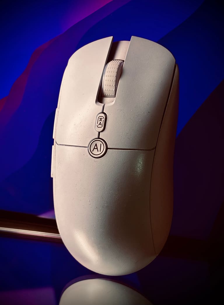 Top view of the Aitroneecs AI Smart Voice Mouse showing the scroll wheel, 文A button, AI button, and the voice and M buttons on the left side